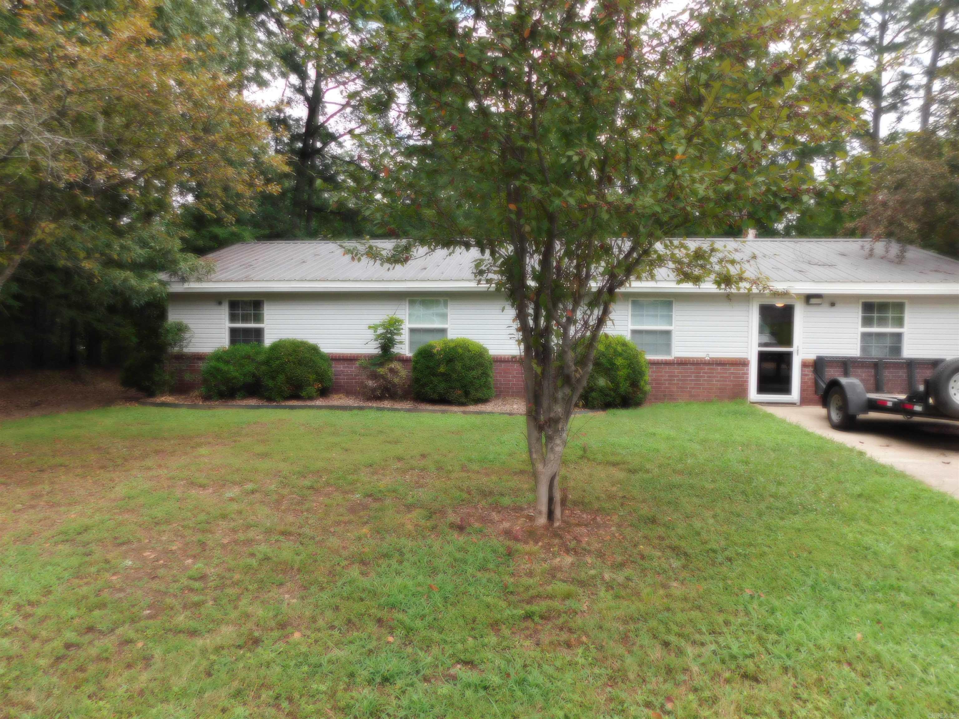 This beautifully updated 4-bedroom, 2-bath home is move-in ready and the perfect blend of comfort, style and functionality! Seller is offering $4000 of buyers close cost paid so you can Enjoy peace of mind with a 2024 A/C unit, 2023 heating system, and a brand-new water heater installed in September 2024. The metal roof is less than 10 years old, and the newer Pella windows with custom window treatments add energy efficiency and charm. Freshly painted interiors and quality brand-level flooring make this home feel like new. Outside, youāll find two storage sheds that stay with the property, offering plenty of extra space. Located in a quiet neighborhood, just one block from Clinton Elementary and with easy access to the interstate ā this home has it all!