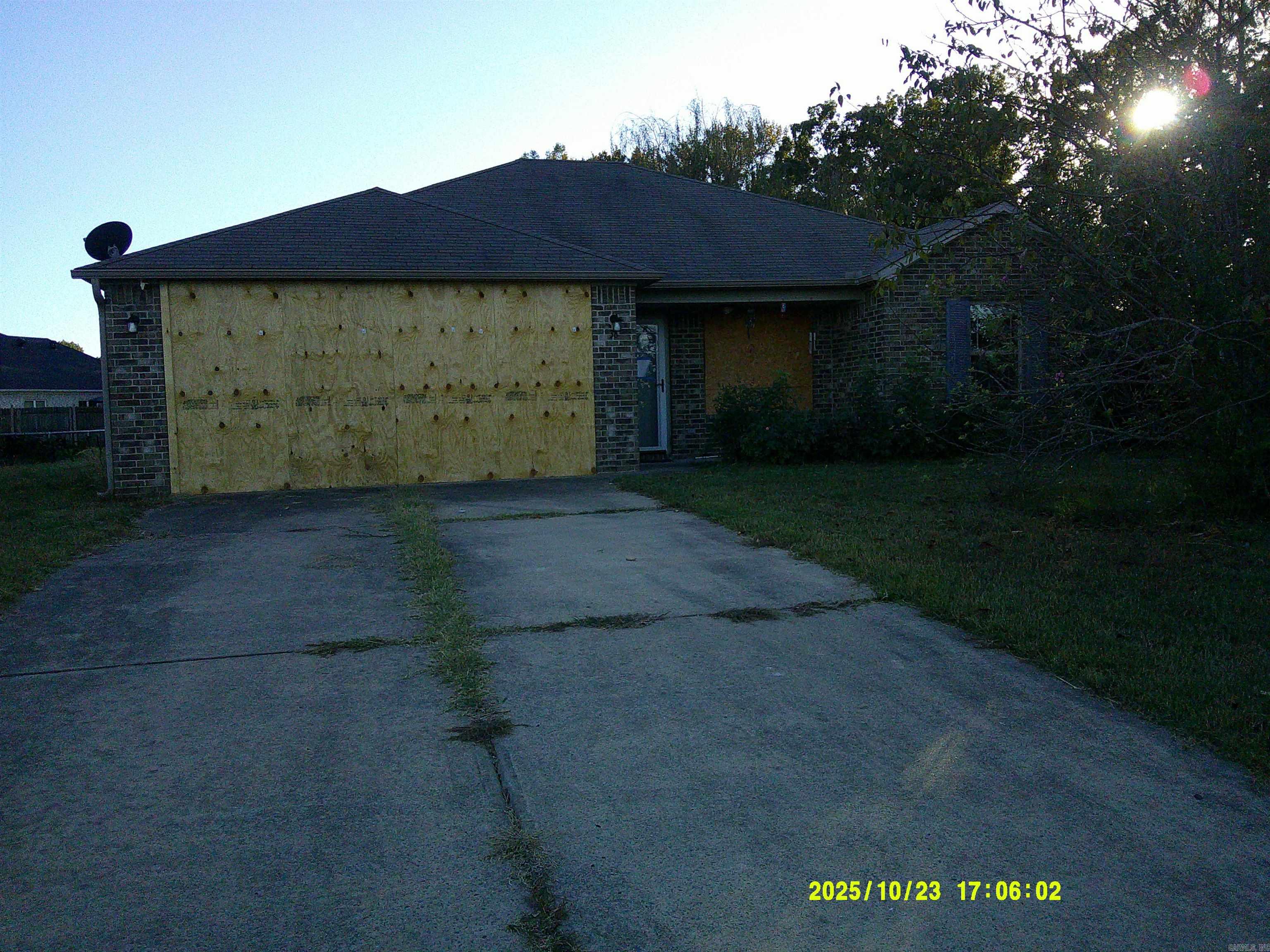 Great opportunity for Greenbrier Living with large yard  House has experienced some fire, smoke damage, garage, siding and fence damage