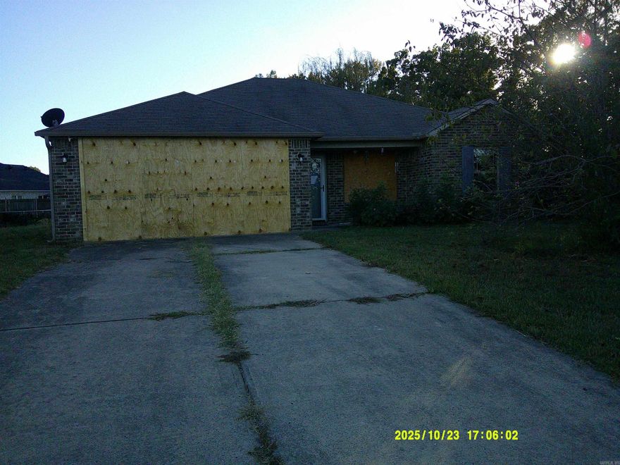 Great opportunity for Greenbrier Living with large yard  House has experienced some fire, smoke damage, garage, siding and fence damage