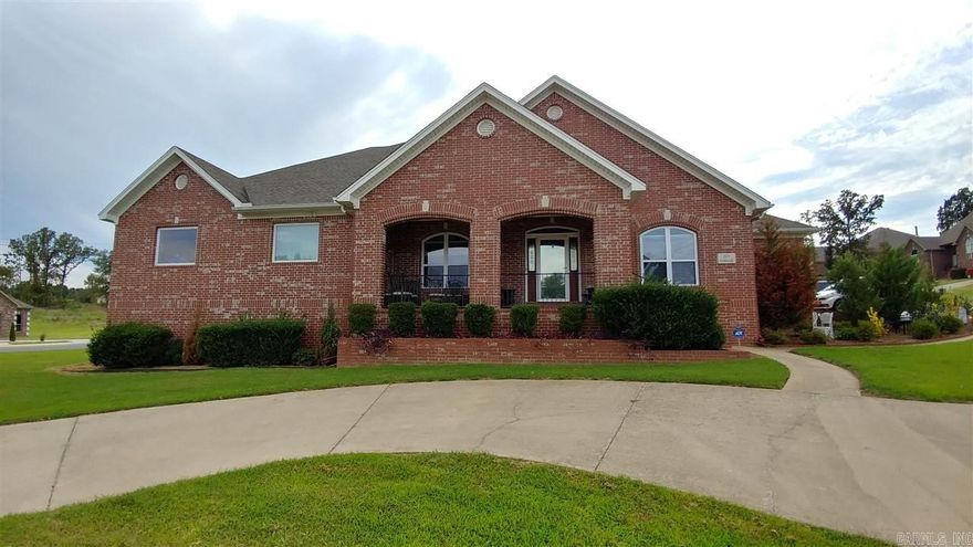 Beautiful Home on Huge Double Corner Lot. 4 bedrooms w/ an office. Beautifully polished stained concrete floors and 10ft ceilings. Fabulous Kitchen with gas range, double ovens, and Granite counter tops. Large master suite w/ storm shelter, 2 huge closets, and Luxurious Master Bath. The two bedrooms upstairs have walk in closets and share a living area or game room and wet bar. The home has a 3 car garage, a walk up attic and so much more. Don't miss this beautiful home. ***SEE AGENT REMARKS***