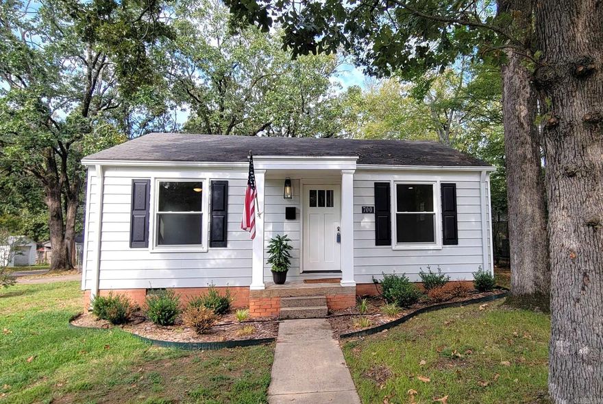 Location is everything, and this newly renovated Hillcrest home delivers with a large corner lot on a quiet, low traffic street. This home features an open design making it feel more spacious and a split bedroom floorplan creating privacy for the primary suite. Restored hardwood floors welcome you throughout the living space. The kitchen features gorgeous stone countertops and new stainless steel appliances. The laundry is conveniently located off the kitchen and doubles as a walk-in pantry space. The primary bedroom suite includes a renovated bathroom and a great walk-in-closet with an automatic light. Enjoy evenings on the patio with a large, fully fenced backyard. Off street parking provides easy access to the kitchen door, and there is plenty of room on this lot for a carport or garage if desired. New tankless water heater. Windows were previously replaced. Hillcrest amenities, UAMS, and schools are just a short bike ride away. Priced well below recent appraisal. This is home!