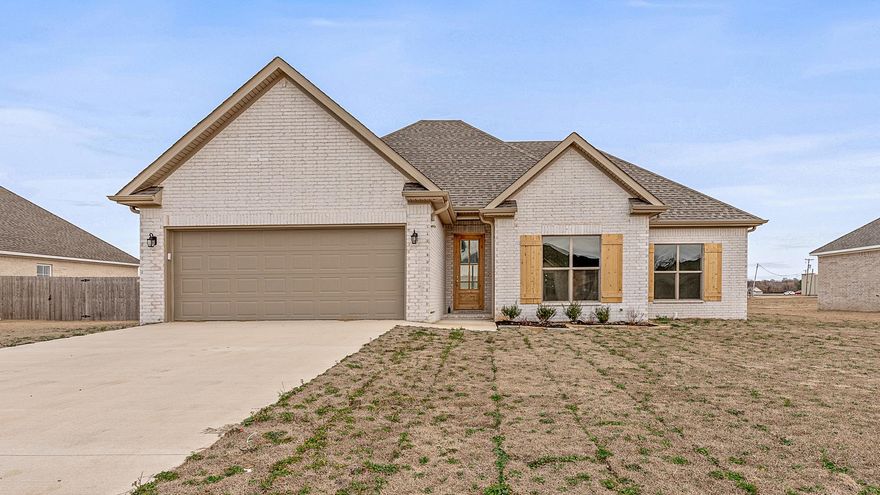 Stunning all brick new construction. This 3 bedroom, 2 bath home has a spacious open concept with a split floor plan. New stainless steel appliances with an awesome screened in porch.