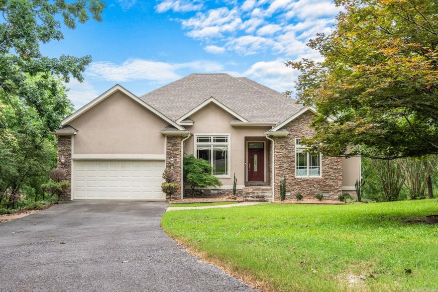Escape to luxury with this stunning lakefront home. Enjoy breathtaking views, soaring ceilings, and elegant updates throughout. The gourmet kitchen boasts granite counters and custom cabinetry, while two decks and an outdoor kitchen make entertaining a dream. Plus, a walk-out basement with storage and workshop adds extra versatility. Don’t miss out on this perfect retreat.
