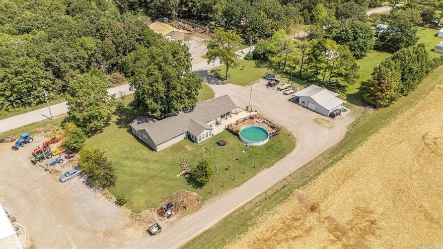 Absolutely a great property now for sale. Nestled between Jonesboro and Bay, You are literally just minutes from the convenience of city amenities but you are miles away from that crazy city life. Sitting on 1.3 acres, This home has that large lot, a big workshop and a swimming pool, that comes complete with a magnificent wood deck. Inside is a great 3 bedroom, 3 bath home that has a enormous mother in laws quarters. The mother in laws wing can be accessed both from inside the home and also has a separate outside house entry. Want even more? It offers a beautiful sunroom as well!! Call today to see this great property