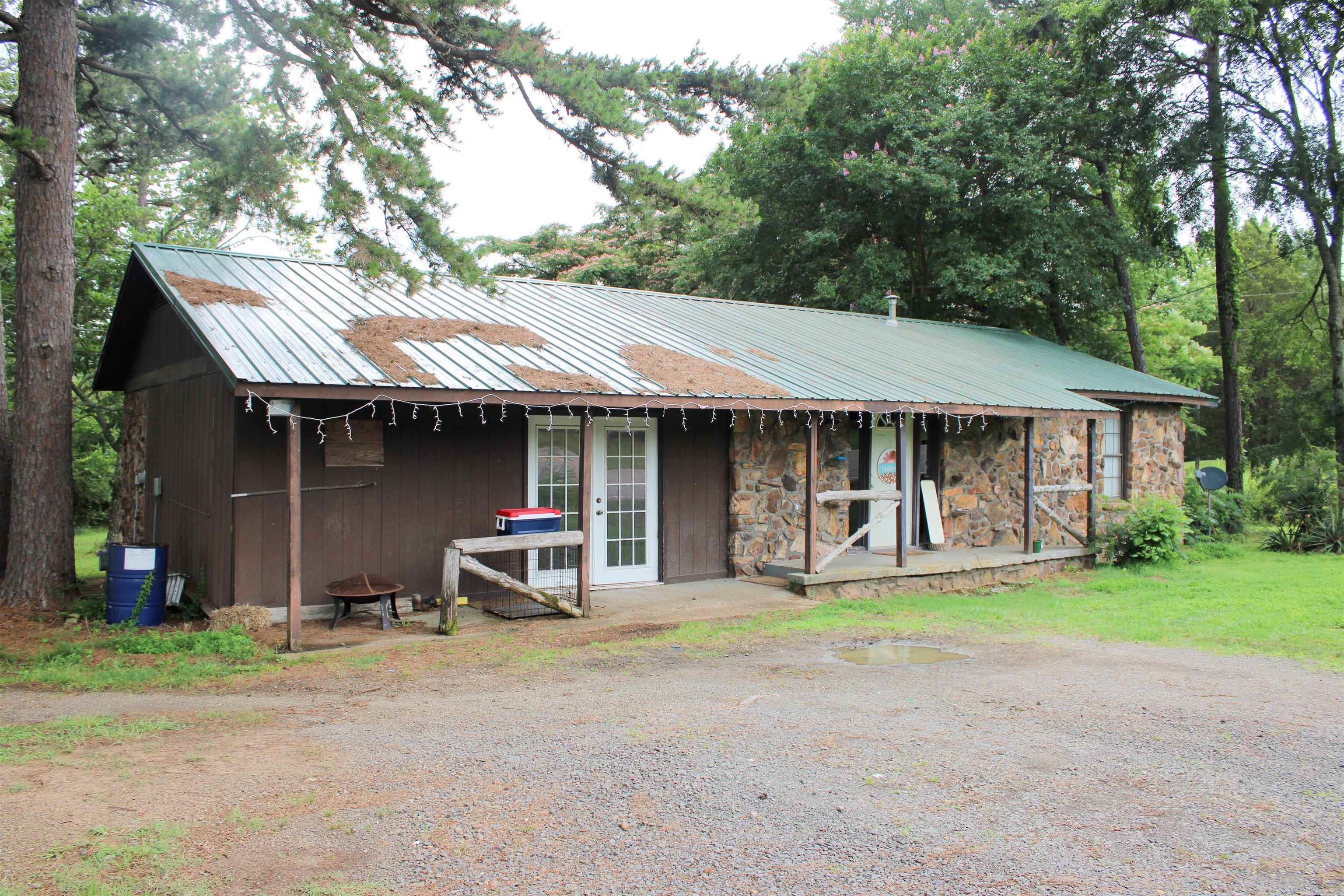 This adorable home is perfect for an investor as a rental or first time home! Metal roof, garage space, 3 bedroom, 2 bath, with a deck off the back sitting on One acre right off highway 16 between Pangburn and Searcy gives a great location for anything you would like to do! Call today!
