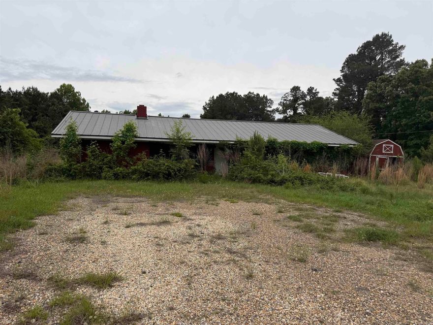 This home has been vacant for a couple years and will need a cleanup of both the house and the yard. However, the seller is overing the home at a price that a buyer should be willing to do some work. It has over 5 acres, a metal roof and a nice country setting.