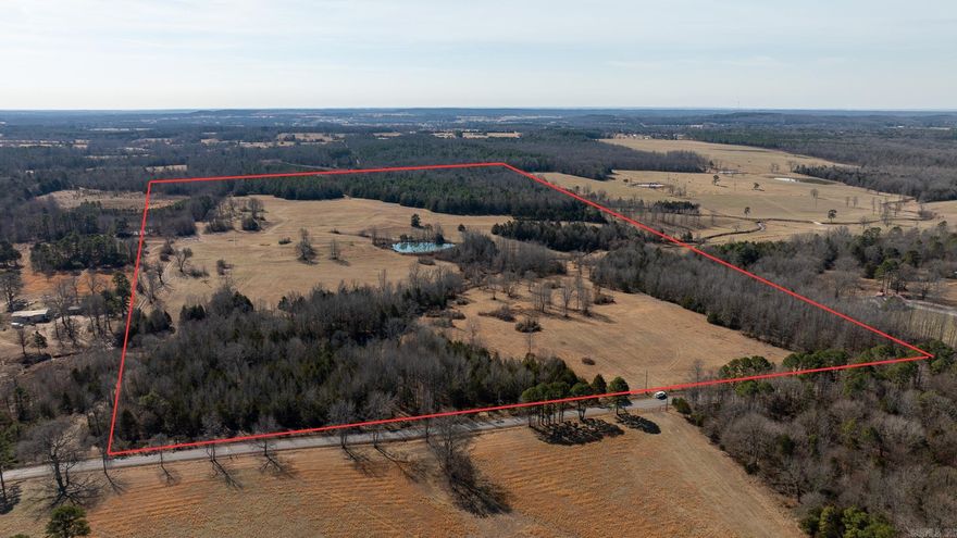 This 90 acres m/l property offers the complete package for your small farm dreams. With three ponds and Graham Branch running through the land, water is plentiful and well distributed across the property.  A beautiful mix of open pasture and timber provides versatility for livestock, recreation, and privacy. Paved road frontage on County Line Rd. ensures easy access, while stunning vista views create the perfect backdrop for your future home.  Several exceptional building sites are scattered throughout the property — whether you’re envisioning a hilltop home with panoramic views or a farmhouse overlooking your pasture and ponds, the options are outstanding.  Conveniently located:  Just 2 miles from Hwy. 5 north of Rose Bud  10 miles from Heber Springs  21 miles from Hwy. 64 at El Paso  And only 15 minutes to Greers Ferry Lake  Properties that combine water, usable pasture, timber, views, paved access, and prime proximity are increasingly hard to find.  This one is a must-see if you’re ready to turn your farm and country living dreams into reality.  (No minerals.)