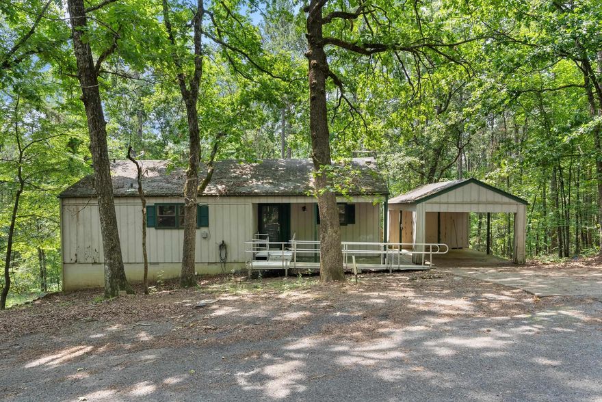 Discover a charming fixer-upper nestled in a secluded, quiet location, perfect for those seeking tranquility and privacy. This property features two bedrooms and one and a half bathrooms, making it an ideal size for a cozy summer retreat or an investment opportunity with great potential for growth.  This property is not only a peaceful haven but also part of a vibrant community offering a wide range of amenities to enhance your lifestyle: 3 pools available for relaxation and enjoyment. Recreational Courts: Tennis and pickleball courts for active leisure. Entertainment Options: Bowling alley for fun-filled evenings with friends and family Facilities: Hart Center offering various fitness opportunities Golf Courses: 2 courses for golf enthusiasts Close to Greers Ferry Lake, perfect for water activities  With a bit of TLC, this property can be transformed into a beautiful summer home or a lucrative investment. The large corner lot provides ample space for landscaping or expansion, while the quiet location ensures a peaceful atmosphere. This secluded retreat is ready to become your dream investment.