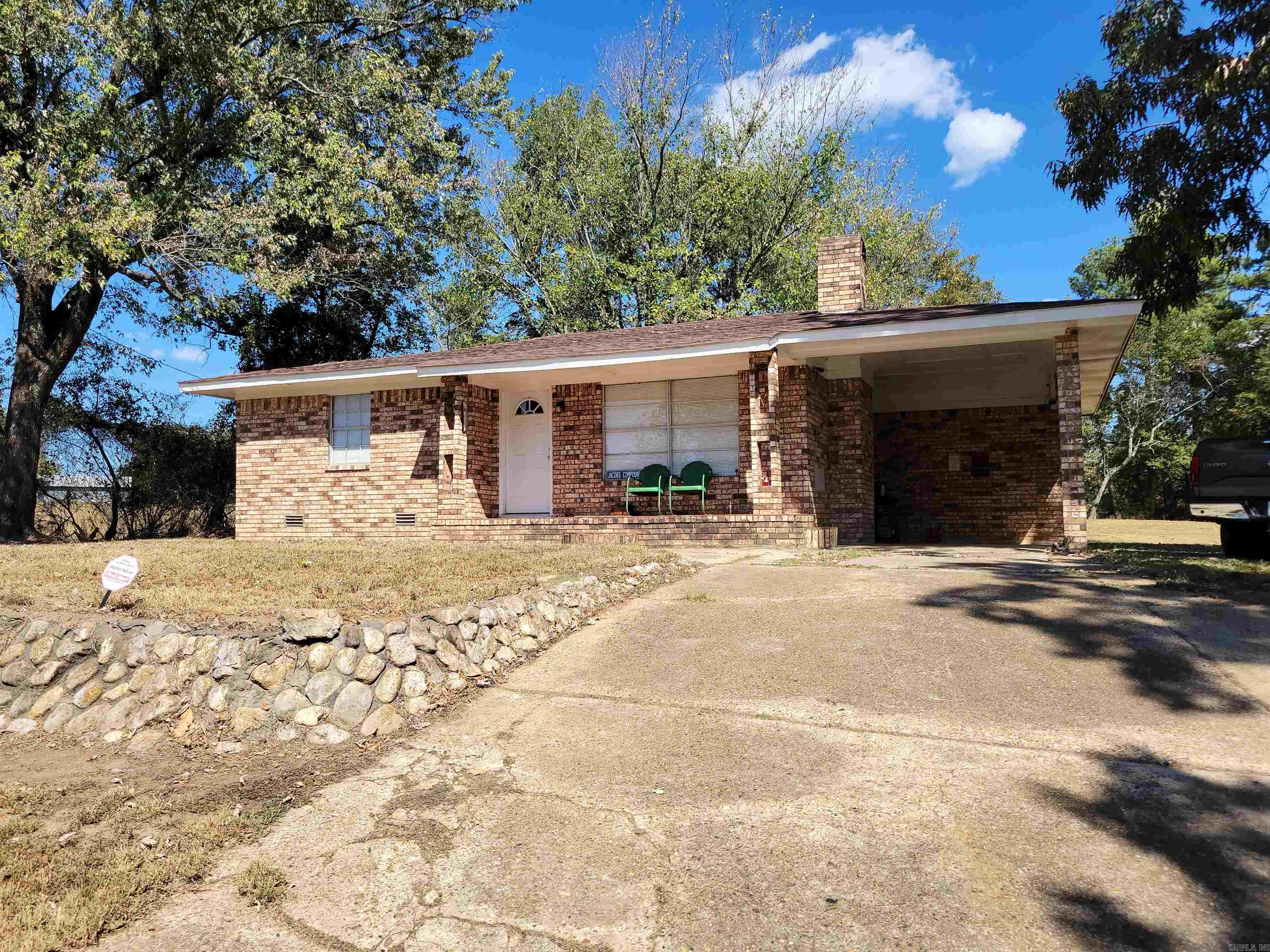 Outdoorsman's paradise! Take a look at this home! Sitting on 2+/-acres of land. Close to the Cossatot River, Wolf Pen Gap, LittleMissouri River and Albert Pike Recreation area. This is a 3 bedroom and 1 bath home with covered carport. Would make for the perfect vacation home or ideal for those seeking to get away from the hustle and bustle of big city life! Call listing agent/office to schedule a tour. Selling "AS IS".