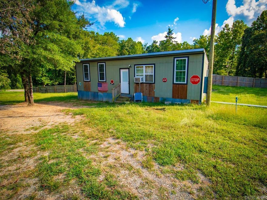 Come check out this adorable home on 2 and a half acres!  It's only 565 sqft, but since it's not under 400 it's technically not a tiny home.  It is a stick built home, not a mobile home. It could be a great rental property if you are looking to invest!  Everything is just 3 years old!