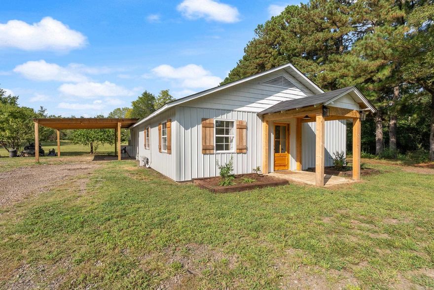 At no fault of the Seller this home is back on the market. So, if you're looking for a place for you and a couple of horses, or if you simply like the privacy of the country life, then this property could be the one. This newly renovated farm home is on 5 acres bordered by trees, creating privacy between you and any neighbors. The property is just 8 minutes off Exit 129 making your commute to work a breeze. The home has a wonderfully wide-open floor plan with vaulted, wood ceilings from the front to the back of the home. The dining space offers seating for 16 around the built-in banquette and farm table with a unique handcrafted, live edge chandelier. Embrace the feeling of nature with the beautiful evergreen shaker cabinets and Hevea wood, butcher block countertops. All farmhouses need a least one barndoor and this barndoor conceals the pantry. Next to the pantry there are 2 freezers, which are negotiable, for your farm-to-table foods. A large primary bedroom provides enough space for a nursery corner or office suite. Don't miss the white peach, plum and fig trees as you walk about the land. The home is on city water but there are two wells on the property that are not in use.