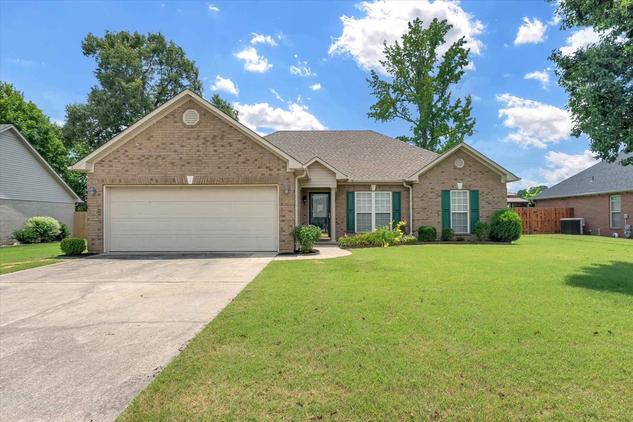 Welcome to Woodland Heights close to Craighead Forest Park off S Culberhouse. This stylish and move-in-ready 3-bedroom, 2-bath home offers comfort, updates, and convenience. Master bath offers both a tub and walk-in shower! The living area is roomy with vaulted ceilings and a gas insert fireplace. Upgrades include fresh paint, a new Samsung range/stove, Rainbird sprinkler system to keep your yard lush and green and Nest thermostat. Newer Roof, water heater and gutters. HUGE BONUS with a My Safe Place tornado shelter located in the two-car garage for quick and dry access! Plus a Whirlpool side-by-side refrigerator and Amana washer and dryer all stay! The fully fenced backyard offers privacy and space for pets or play. Don't miss your chance to see this beautifully maintained home...Schedule your tour today!
