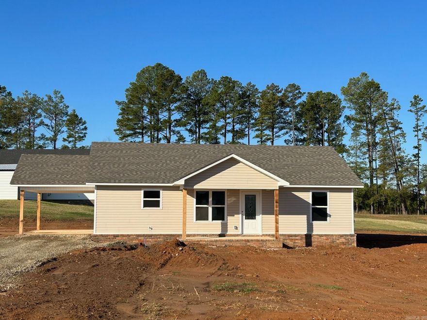 NEW CONSTRUCTION!!  This 3 bedroom, 2 bath home is located right outside the Clarksville City Limits.  Great location, not far from Lake Ludwig.  Open floorplan, laundry room, and one car attached carport.   More pictures to come.