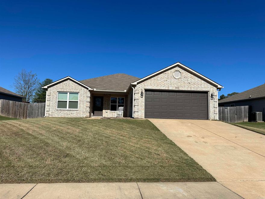 This well-kept home will live like new!  It has just what you're looking for:  Fresh paint, an open floor plan, a large kitchen with an island, 3 LARGE bedrooms, a spacious laundry room, and a fenced, level and private backyard!  The primary suite features a large walk-in closet, a soaker tub, and a double vanity!  The other two bedrooms are on the opposite side of the house, and are both very spacious with nice closets! The kitchen boasts an island, lots of counter & cabinet space, and a new dishwasher and microwave (2023)!  Lots of great space and very convenient to Bryant Schools!