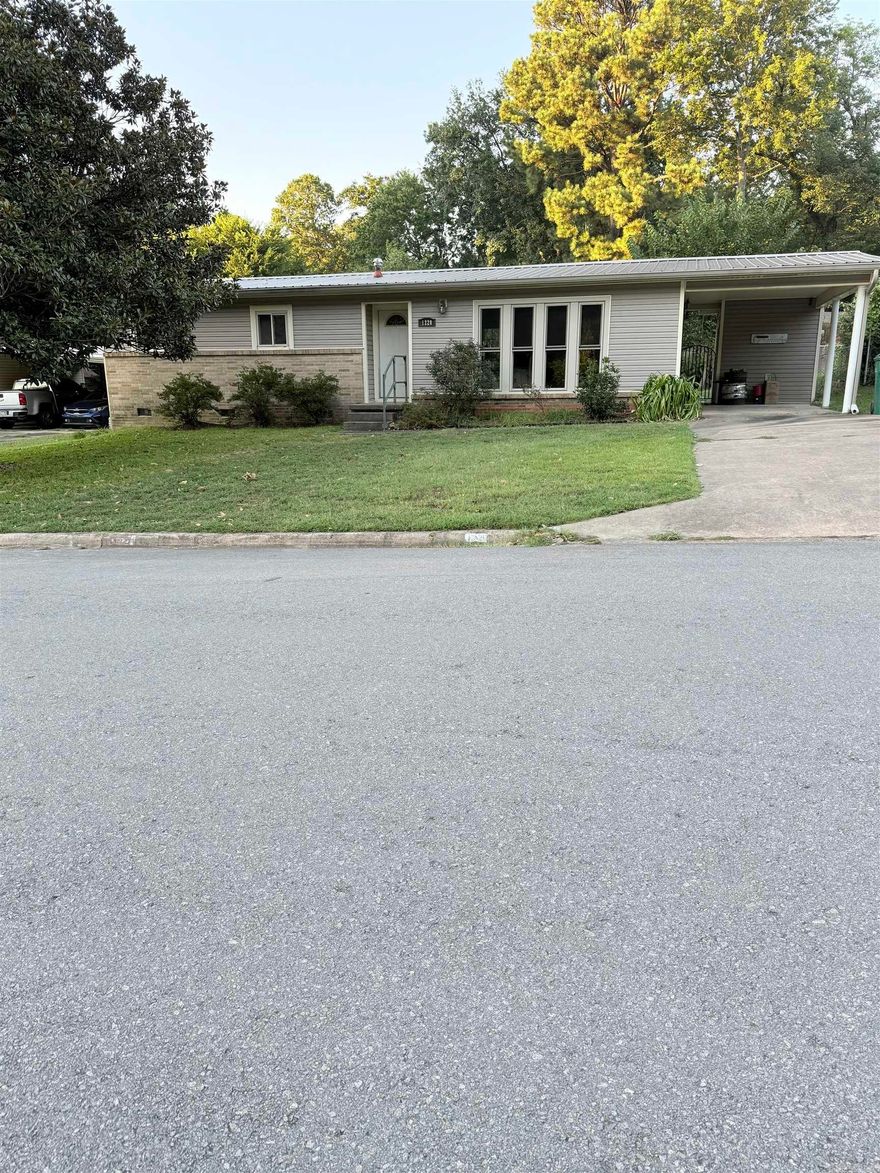 Discover the potential of this unique 3-bedroom, 2-bathroom home offering 1,402 Sq.Ft of living space and plenty of character! Inside, you'll find a remodeled primary suite with updated vinyl blinds, a gas stove for the home chef, and a new water heater for added peace of mind. While the home could use some TLC, it offers a great opportunity to make it your own.  Step outside and enjoy the fenced backyard oasis, complete with a storage shed and an impressive variety of fruit trees and vines, including mulberry, peach, apple, pear, fig, apricot, blackberry, walnut, grape, and muscadine- perfect for anyone who loves gardening or farm-to-table living.  Selling as-is- this one is a must see!