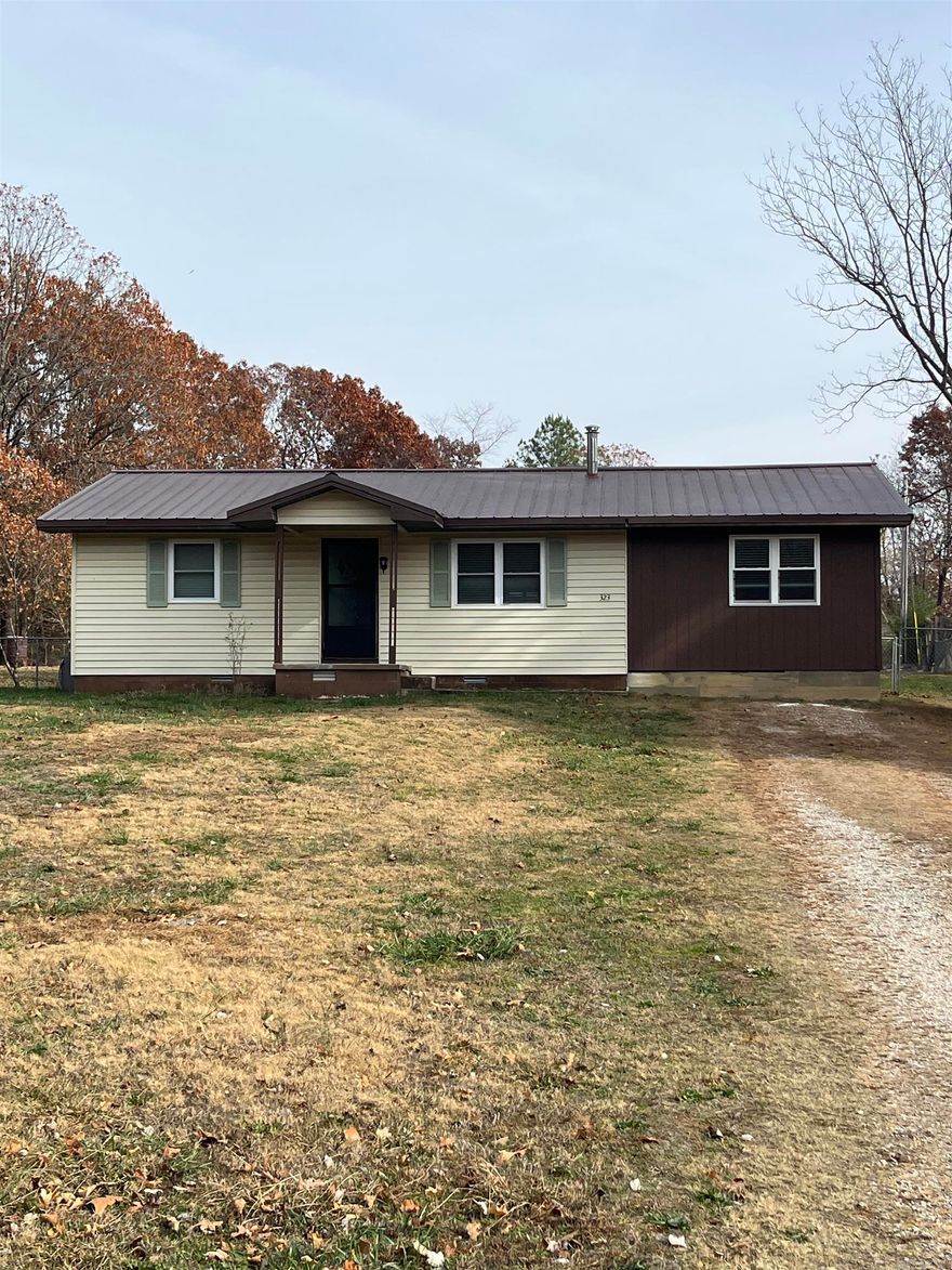 Well maintained home on over 1/2 flat lot in town.  Nice big fenced in backyard with multiple storage buildings.  Beautiful oak cabinets with all the appliances.  Low maintenance with several modern upgrades.  Move in ready!