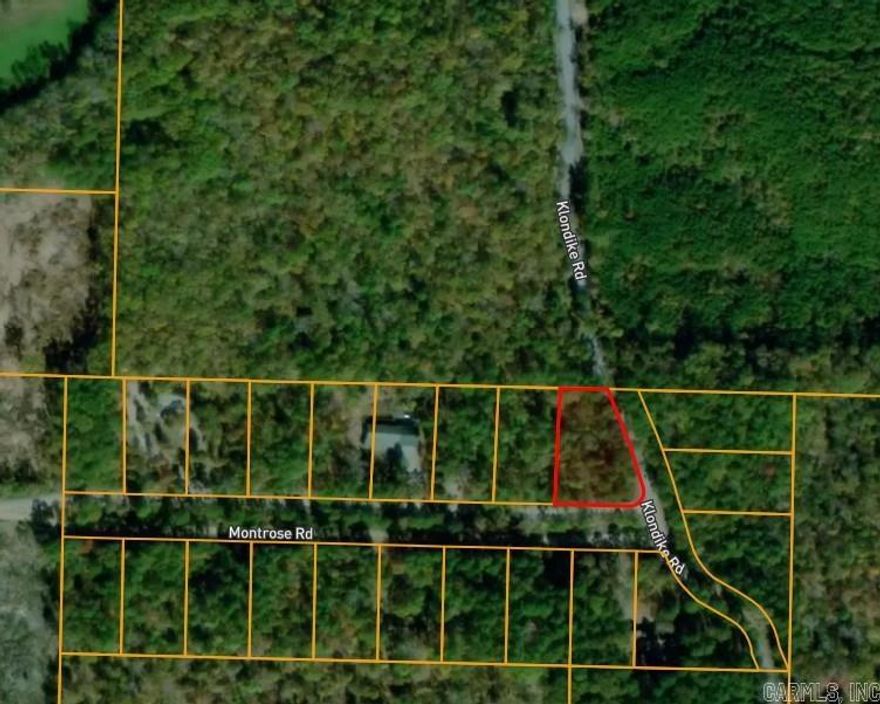 Wooded corner lot in Pinewood Subdivision, Van Buren County, AR, just minutes from Greers Ferry Lake. Great spot to build a home, cabin, or weekend getaway with plenty of privacy and natural surroundings. Corner location allows flexible access and layout options. Enjoy a quiet setting with easy access to boating, fishing, and outdoor recreation. Solid opportunity for a homesite or investment near the lake.