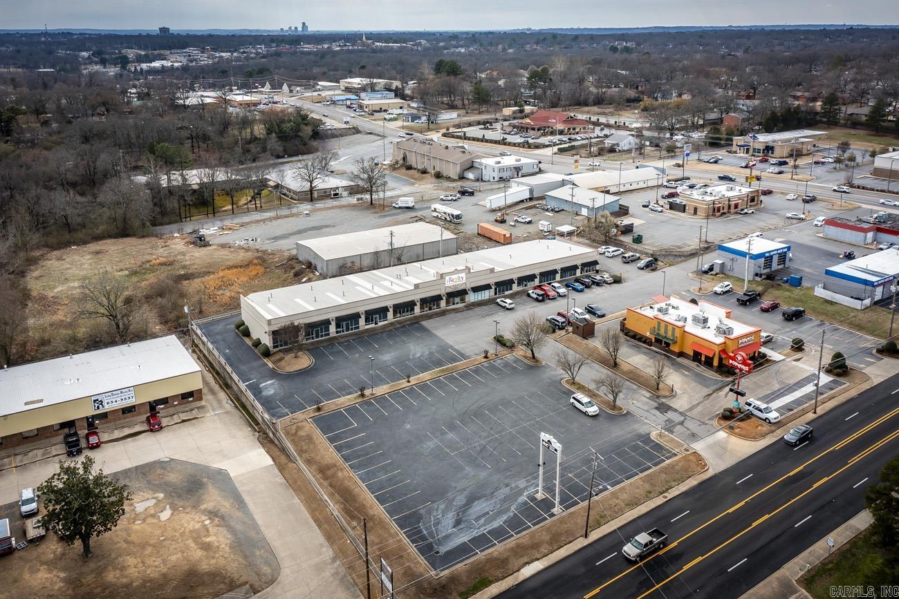 Located in the heart of Sherwood. Excellent visibility, Over 16,000 VPD on Kiehl and 28,000 VPD on Hwy 107/JFK. 15,489 sqft on 1.82 acres (including ½ acre outparcel). Currently has two tenants that occupy ? of building and ? is individual office leases.