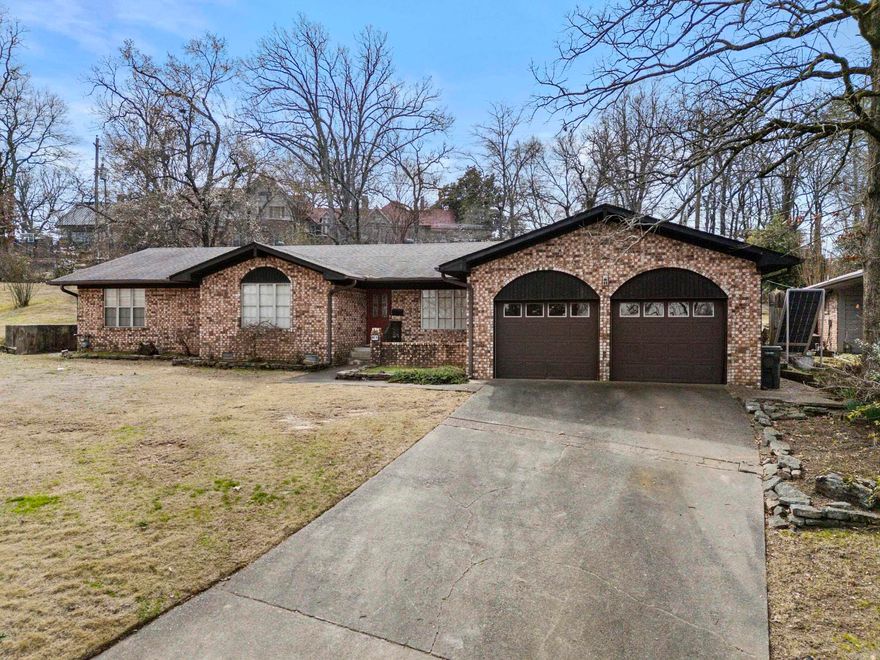Very nice, all brick home in the Oakwood Manor Subdivision, AND on a Cul De Sac! This home has a large Den/Family room, with Built-ins on both sides of the Fireplace.Sellers have provided Brand New flooring in most of the home!!It has a  Spacious  kitchen, with plenty of cabinets and counter top space! Master bedroom is large, with a walk in closet, and master bath. All bedrooms are a spacious! So close to Restaurants, schools, River Market, and more!  Property being sold "AS-IS"