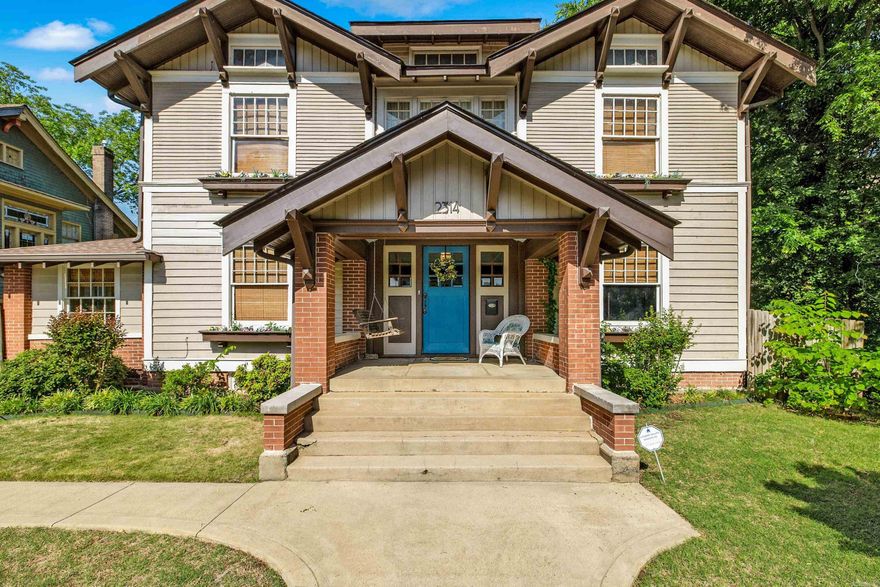 Historic charm like this is truly priceless! The Arthur C. Becker Home, a beautifully restored 1900 Craftsman, blends timeless character with thoughtful modern updates while remaining faithful to its original design. Built during Becker’s career with Niemeyer Lumber Company, the home showcases stunning original tiger oak millwork, wainscoting, and an impressive oak staircase. Custom window coverings are featured throughout. Main level offers a grand foyer, living room, bright sunroom, family parlor, formal dining room, expansive breakfast room, updated kitchen with pantry, 2 gas-log fireplaces, original French and pocket doors, and a full bath. Upstairs features a spacious primary suite with dressing room and oversized bath, 2 additional bedrooms, clawfoot tub bath, original built-ins, art gallery space, and a cheerful laundry room converted from the former sleeping porch. A nearly 500 SF drywalled basement provides excellent workshop/storage space. Outside enjoy mature landscaping, a large patio, grilling deck, raised garden beds, and off-street parking for multiple vehicles. Convenient to Pettaway, SOMA and Downtown!  PREINSPECTED!