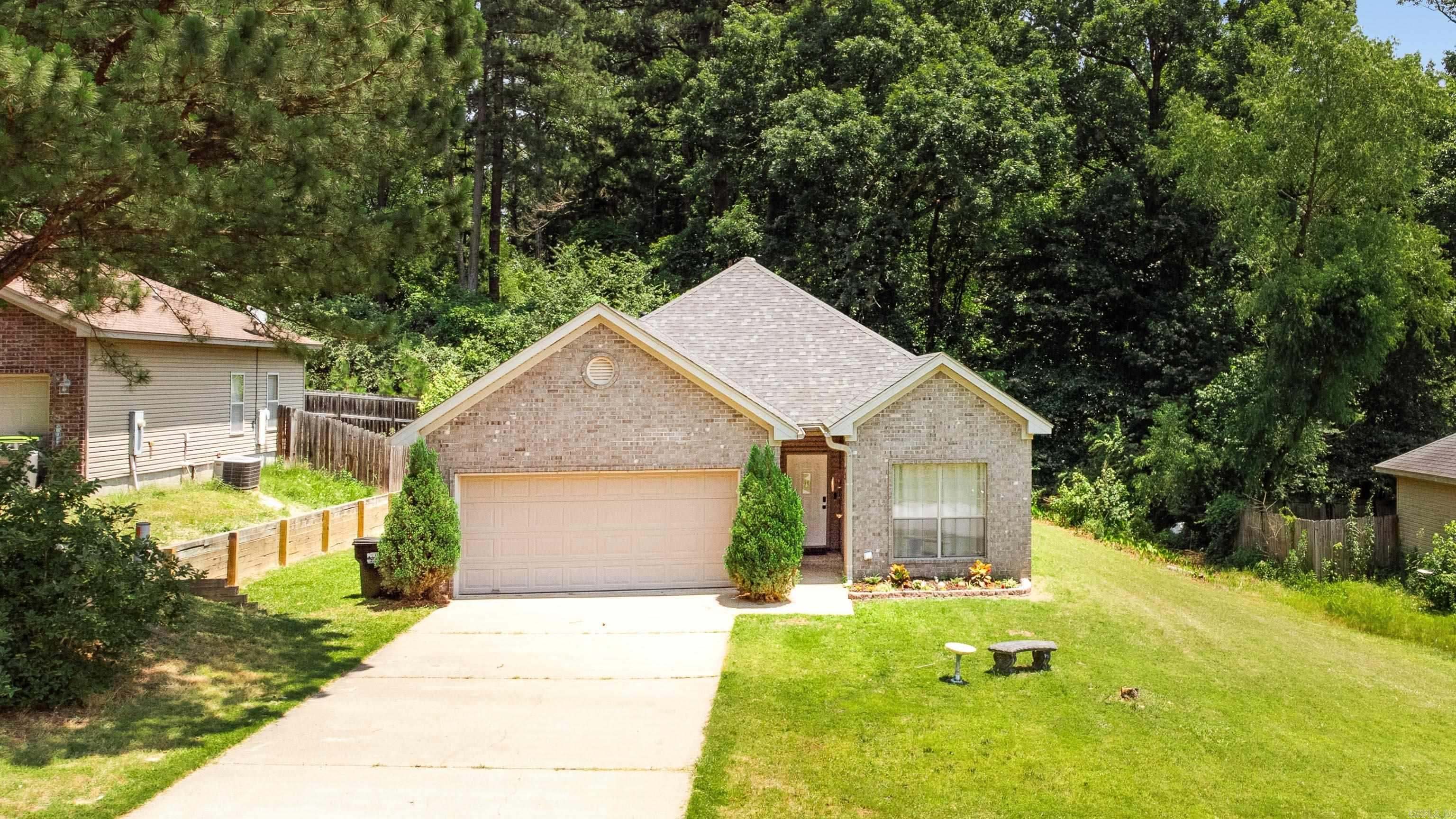 This updated 3 bedroom 2 bathroom home combines smart features with everyday comfort in a layout that just makes sense. The open living area flows into a stylish kitchen with granite countertops, stainless steel appliances, a subway tile backsplash, pantry, and a touch-activated kitchen faucet. The dining area features a smart light fixture, adding a bit of modern convenience. All bedrooms are located down the hall, including a generously sized primary suite with a double vanity in the attached bath. Flooring includes durable laminate in the main living areas, tile in the kitchen and bathrooms, and carpet in the bedrooms. Out back, enjoy a covered patio thatās perfect for relaxing or grilling. The 2-car garage includes a WiFi-enabled opener with timer control. Washer, dryer, and refrigerator will convey, making move-in even easier. Roof was replaced in 2022.