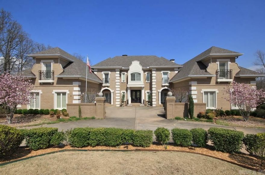 Beautiful home in gated Chimney Rock with gorgeous iron doors. Two story living area with large windows and doors.  Master suite with wet bar, fireplace, wonderful bath and exercise room or study. Three BR suites upstairs with balconies and a bonus room. Updated kitchen with bkfast bar and keeping room. Large formal DR with butlers pantry. Separate office close to master. Circle drive and 2, two car garages, beautiful salt water pool, outdoor cabana and outdoor kitchen. Home is immaculate & ready for you.