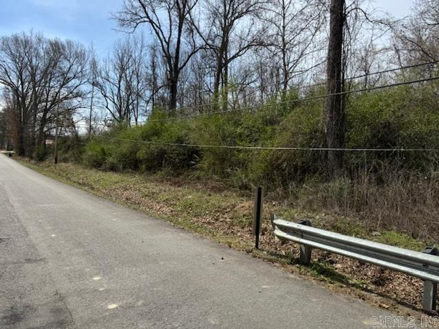Beautiful, wooded piece of land that sits at the end of Polk Street.  Creek runs through property with pond.  Close to downtown and all of Cabot's amenities. Country feel with city advantages. Several building spots. Look for sign.