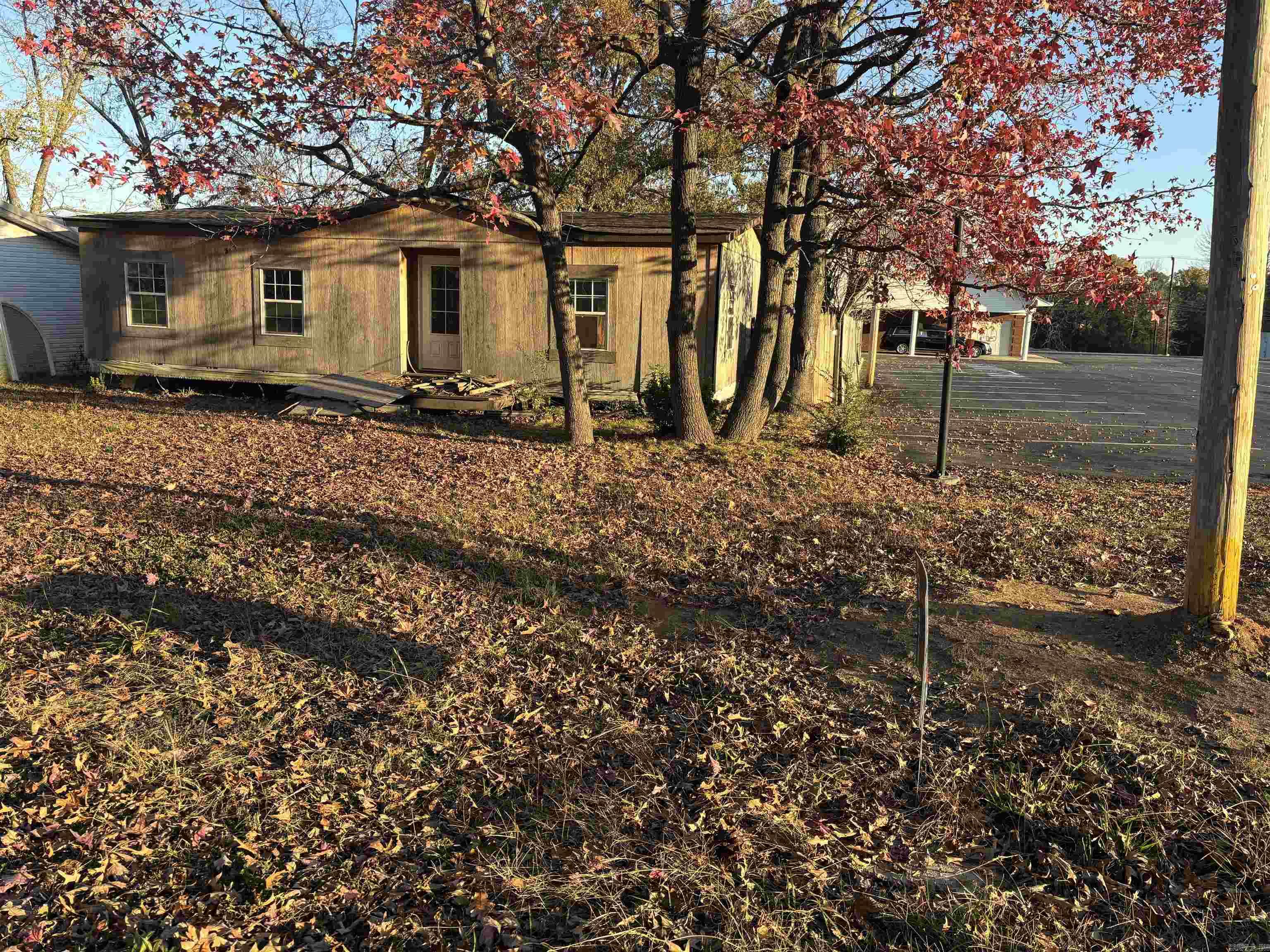 Centrally located in the city of Cabot .17ac residential lot (could possibly be rezoned commercial) Has a double wide mobile home on it at no value!