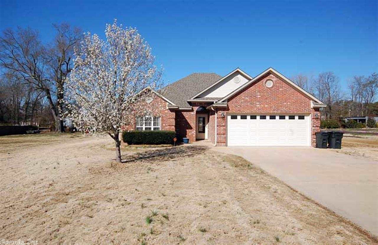 Just like new, home on acreage, minutes from the base, in the sought after CABOT SCHOOL DISTRICT! 3 bedroom 2 bath home, laminate/wood flooring in entry way that opens up to a vaulted ceiling in the living room w/French doors to partially covered porch/deck, Kitchen has great prep & storage space w/pantry, stainless steel appliances, & large dinning area off of kitchen. Newer storm doors installed, brick/vinyl combo on exterior, swing set conveys w/property, almost a full acre!! take the virtual tour!