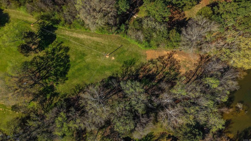 Tucked away in the trees, this cozy wooded lake lot on Lake Overcup offers a peaceful, private setting with the beauty of the water just steps away. Smaller in size but big on charm, it’s perfect for a weekend getaway, fishing retreat, or a quiet spot to build your dream cabin and enjoy nature at its best.