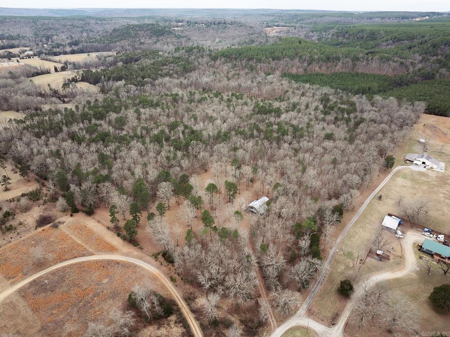 Discover 40 acres of beauty, complete with a barn and upstairs living quarters. This versatile property offers endless possibilities—whether you're into farming, ranching, hunting or simply enjoying peaceful country living. NO MINERALS AVAILABLE  Your dream rural lifestyle starts here—don't miss this opportunity! Call for appointment. See agent remarks