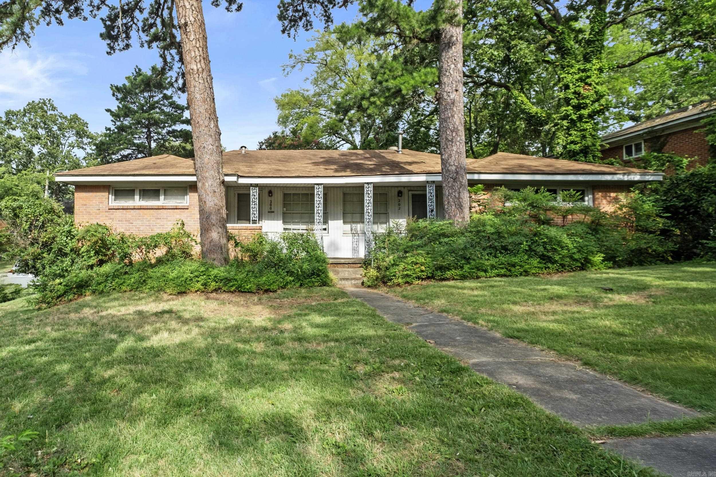 Discover an exceptional investment opportunity with this well-located duplex in the desirable Hillcrest neighborhood, just moments away from the University of Arkansas for Medical Sciences (UAMS). This property offers the perfect blend of convenience, charm, and potential for rental income. Situated in the heart of Hillcrest, this duplex is ideally positioned for easy access to UAMS, local shops, restaurants, and parks, making it attractive for both students and professionals.The duplex features two spacious and well-designed units, each offering 2 bedrooms and 1 bathroom. Each unit boasts a bright and airy living space, perfect for comfortable living or rental opportunities.Whether youāre looking to live in one unit and rent out the other, or seeking a solid addition to your investment portfolio, this duplex offers endless possibilities. Donāt miss out on this fantastic opportunity! Schedule a showing today and explore the potential this property has to offer.