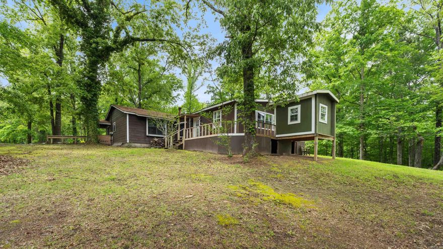 Escape to the quiet of country living south of Brightstar, AR! Tucked down a private dead-end road, this secluded property offers the peace and privacy you’ve been looking for. This 45-acre rural property is surrounded by mixed timber with a pond just behind the home, it’s a perfect setting for enjoying the outdoors, wildlife, and rural life. Inside, the recently remodeled home features a spacious layout with 3 bedrooms, 2 baths, and a bonus room (which is currently being used for a 4th bedroom), along with multiple handicap-accessible features for added flexibility. The property also includes a large workshop with endless possibilities—guest quarters, rental potential, hobby space, or business use—plus a substantial tractor/storage shed for all your equipment and storage needs. Whether you’re searching for a private homestead, hobby farm setup, or country getaway, this property delivers space, versatility, and Arkansas charm. **See photos for land layout - survey attached.