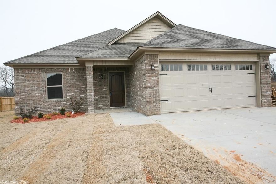 Great open, split floor plan with gorgeous crown molding, hardwood floors, stained cabinets, granite countertops, stainless steel appliances, recessed lighting, built-ins throughout and much more.  Master suite is oversized and has double vanity, shower and separate jetted tub, built-ins in the walk in closet for great storage and use of space. All of this in the sought after Cabot School District!  Call today before this one is gone!