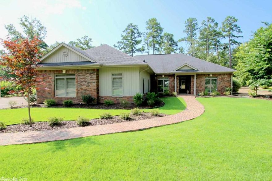 Let the beautiful brick walkway welcome you into this tasteful Ponce de Leon golf home. Extra large windows, walnut flooring, tray ceilings, 2 living areas, separate dining. Beautiful kitchen with Amish-made maple cabinets, stainless LG appliances, pull-outs and appliance garage. Large walk-in tile shower in master has 2 shower heads and body sprays. Over-sized 3-car garage with laundry sink, and 4 large windows. Lg laundry with folding/hanging areas. Instant hot water & new Trane heat/air 2011. SEE REMARKS