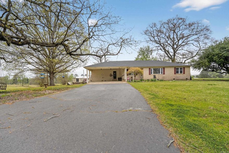Charming 2-bedroom, 2-bath home situated on approximately 2 acres in Bismarck! This all-electric property offers comfort, convenience, and extra space with a whole-home Generac generator, providing peace of mind year-round. The spacious shop with 3 bay doors is perfect for storage, hobbies, or workspace needs. A bonus room/office offers flexible use and could easily serve as a 3rd bedroom. Conveniently located just minutes from Lake DeGray State Park and within the highly sought-after Bismarck School District, this property is a fantastic opportunity for those seeking country living with modern amenities. Selling AS IS
