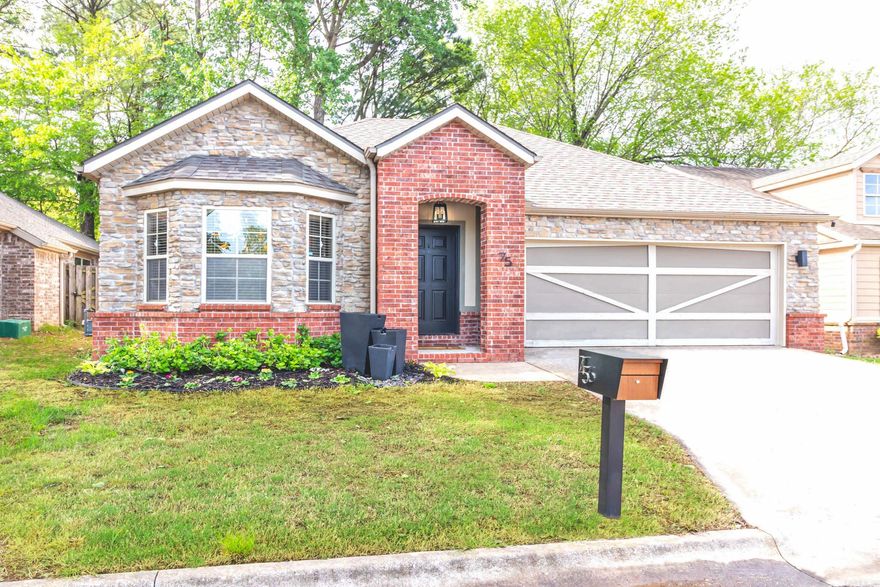 This beautifully maintained, move-in ready home offers 1,490 square feet of stylish, functional living space with 3 bedrooms and 2 bathrooms. Step inside to an inviting open floor plan featuring solid surface flooring throughout—perfect for easy maintenance and modern living. The kitchen is a standout with sleek granite countertops, ample cabinet space, and a seamless flow into the living and dining areas, ideal for entertaining or relaxing with family. The spacious primary suite provides a true retreat, complete with a generous walk-in closet and a well-appointed en suite bath. Enjoy the benefits of a prime location with easy access to the University of Arkansas, the Razorback Greenway, Washington Regional Medical Center, and I-49. Whether you’re a first-time buyer, investor, or looking to downsize without compromise, 75 Madrid is the perfect blend of comfort, convenience, and style. Don’t miss your chance to own this gem in one of Fayetteville’s most desirable areas!