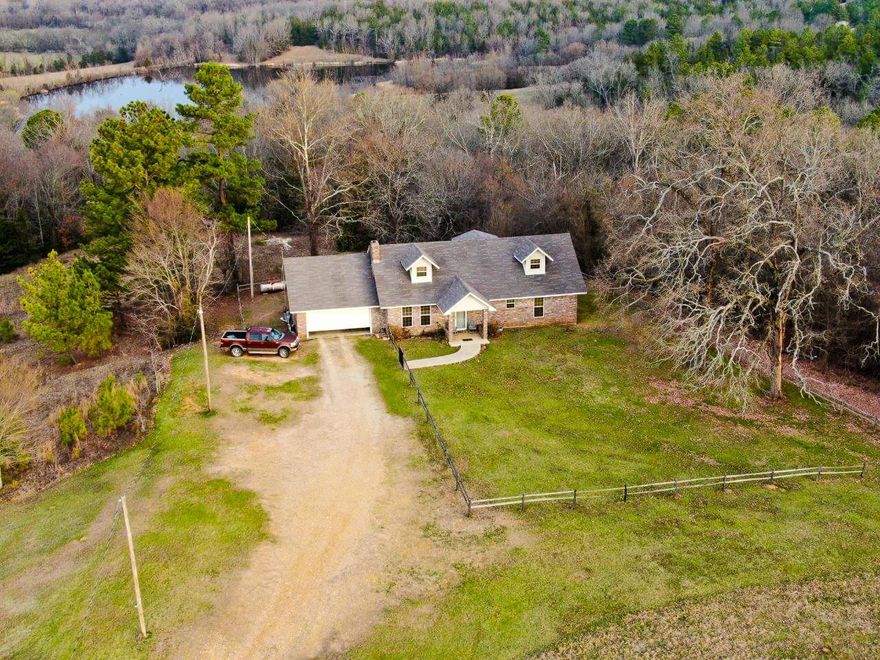 5 Family generation owned Ranch with its own private road that ends at the property. This has been in same family since late 1800s and first time on the market to the public. Has 414 Ac with 300 being prime pasture land and 100 plus acres mature forested/tomber land, a 12 ac stocked lake and artisian wells located on the property. Min hous is immaculate 4 bed, 3 bath large open living/dining with FP. See 360 degree 3D video walk-through of home. Guest/bunk house is 3 bed, 2 ba with CH&CA. Several barns, shops and hay sheds on the property.Pond is home to and eagle family, abundant wildlife throughout this country paradise. Located in hill country of SW AR in 4 states corner about 30 Miles Due N of Texarkana AR/TX close to Millwood Lake and pristine White Cliffs area. Only qualified pre approved buyers please.