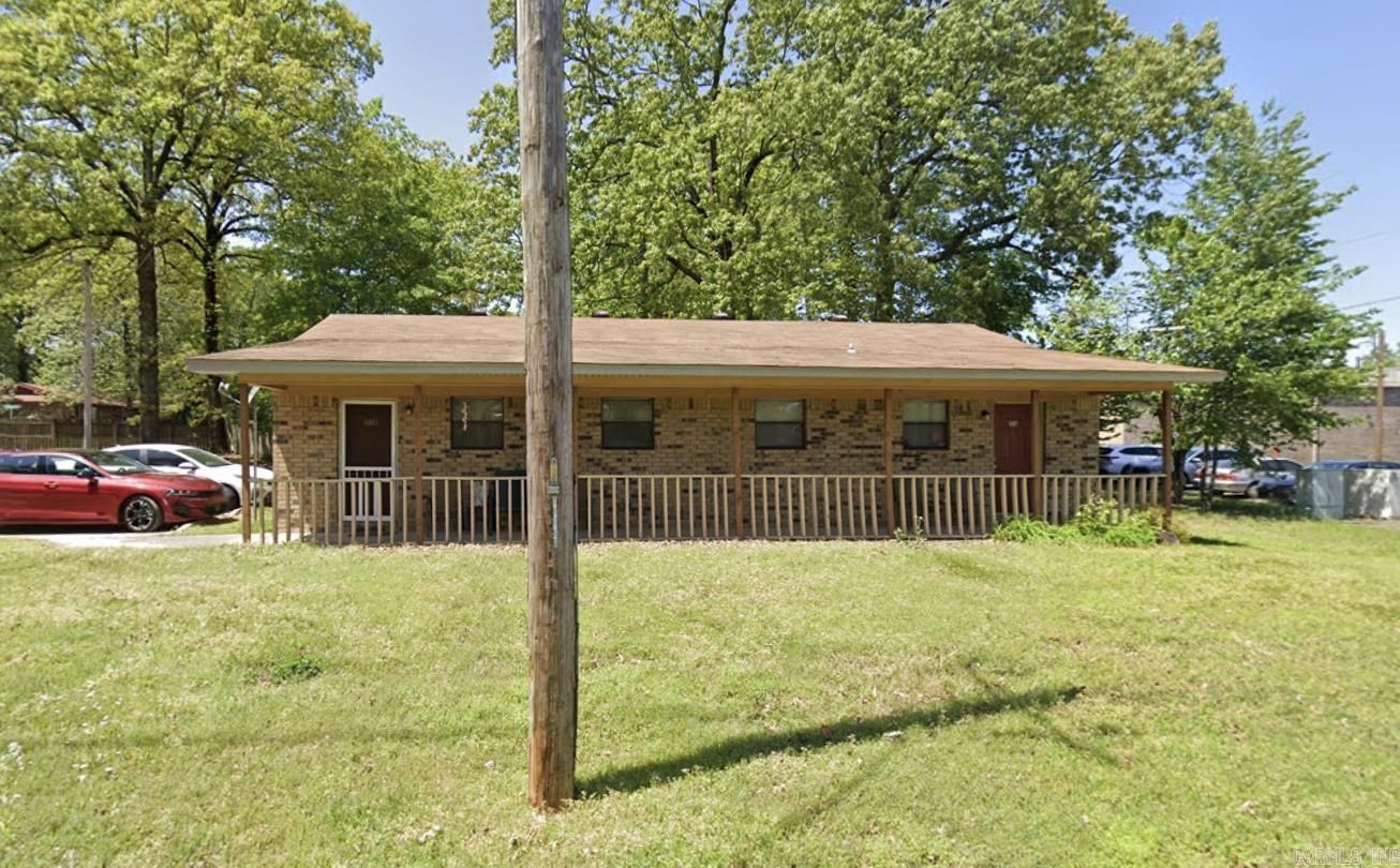All units occupied. NO showings until under contract. No walking around, residents are not aware. Property is available to purchase with adjacent duplexes and triplexes also listed in CARMLS, which include 9000 Woodbine, 9001 Woodbine, 9006 Woodbine, 9007 Woodbine, 105 Lantrip. Listing price for all six properties (14 units total) is $1,260,000.