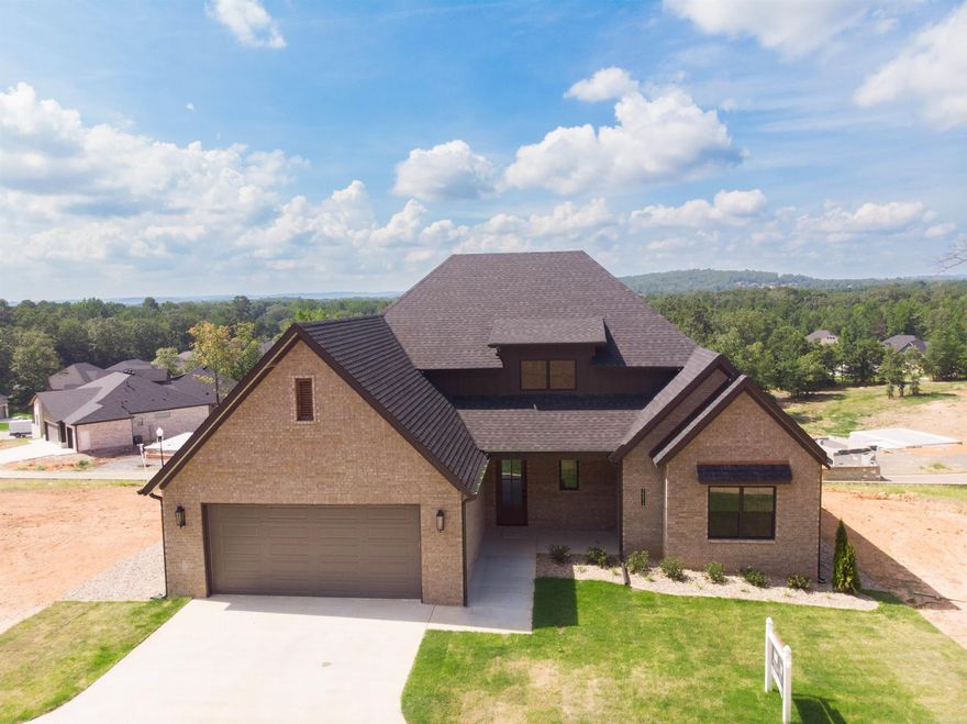 Welcome to 15212 Matterhorn! VIEWS OF PINNACLE FROM PRIMARY SUITE, DINING ROOM AND BACK PORCH This exquisite MOVE IN READY 4-bedroom, 3-bathroom home is located in the highly sought-after *Award Winning* Stonebrook gated community in Maumelle. With 2,551 sq. ft. of beautifully designed living space, this home combines luxury and comfort in a serene setting.   Step inside to discover a spacious open floor plan, ideal for entertaining and everyday living. The home features high-end finishes throughout, with plenty of natural light pouring into every room. The well-appointed kitchen is perfect for the culinary enthusiast, while the living areas offer space to relax in style. In addition to the luxurious primary suite, this home offers an entire guest suite as well.  The property overlooks the pond and features stunning Pinnacle and mountain views. Living in Stonebrook means access to incredible amenities and a vibrant community.  Don't miss this home! Schedule a self guided tour on the Hines Homes website