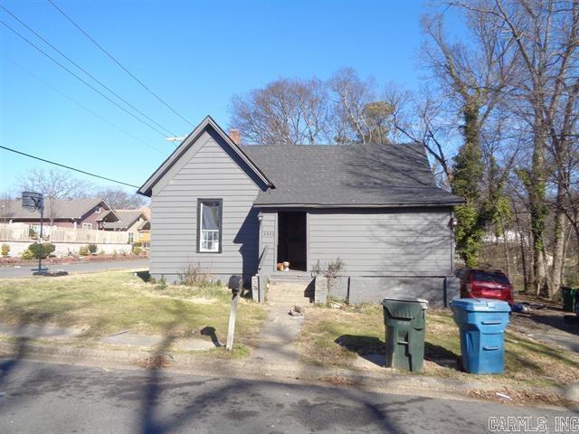 Very spacious investment opportunity sitting proudly on a large corner lot. Located right in the shadows of the Central High School Neighborhood. Property being sold As IS Where Is. Agents PLEASE see Agent Remarks for contract submissions and showing instructions.