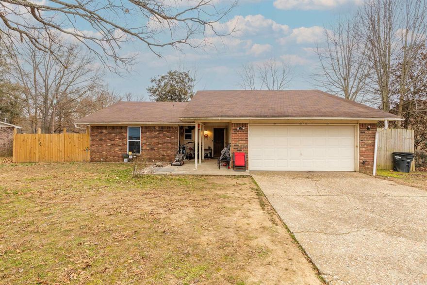 4 bedrooms, 2 baths, granite countertops, walk-in closets, spacious living room, separate dining area, HUGE rooms, tile in all wet areas, LVP in living room and halls, carpet in bedrooms.  One car garage with extra storage space.  Windows replaced about 3 years ago, updated appliances, roof is less than 10 years old, fenced back yard!