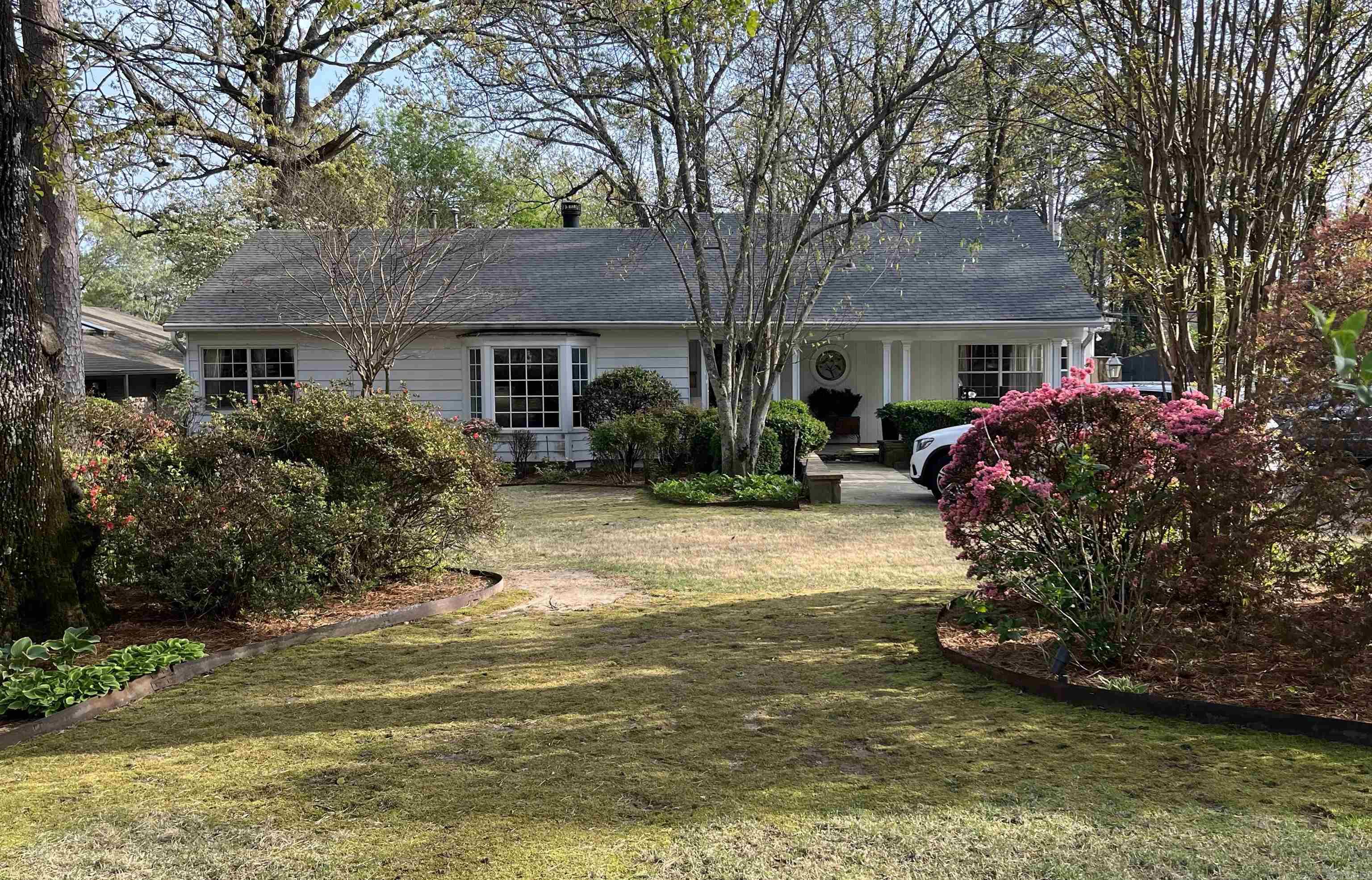One level home in the Normandy/Pine Manor area. Hardwood floors through most of the home. Updated kitchen with newer cabinets, countertops,some older appliances. Two living areas. Primary suite was an addition with a wonderful primary bathroom and closet and french doors out to the backyard and pool area. The exterior was immaculately landscaped with a pool. Full house generator.
