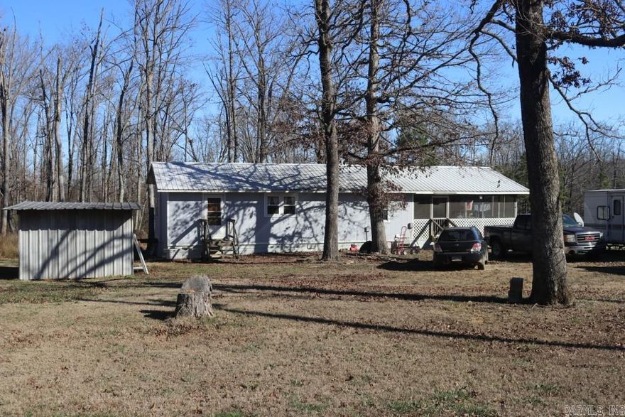 Escape to the heart of the Ozarks with this charming 2 bedroom, 2 bath mobile home offering 1,160 square feet of comfortable living space on 2.8 acres of level, fully fenced, usable land. This property features a natural spring and is surrounded by abundant wildlife, including deer, turkey, songbirds, and more.  Located just 15 minutes from downtown Mountain View, you will enjoy quick access to the famous courthouse square, live folk music, shopping, dining, and the nearby Ozark National Forest. Whether you are searching for a full-time residence, weekend retreat, or summer getaway, this unrestricted property offers the flexibility to use and enjoy it your way.  2 Bed | 2 Bath | 1,160 Sq Ft 2.8 Acres – Level, fenced, and fully usable Natural spring on the property Excellent wildlife viewing No restrictions Convenient access to Mountain View and all Ozark attractions