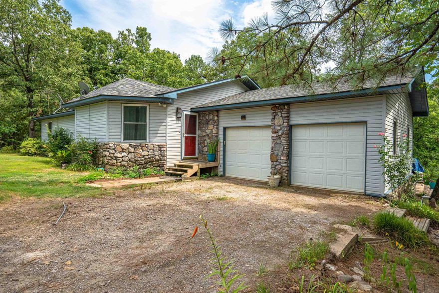 Your new home off of Hwy 270 & Brady Mountain Road in Royal is waiting. 3 acres of tranquility (1 acre cleared with house & 2 wooded acres.) Cool off in your backyard oasis with an above ground swimming pool and deck! New roof in 2024. Stove, dishwasher, interior vents cleaned & sanitized, new pool liner in 2023. Vinyl windows & carpet 2022. New pool pump in 2021. Short term rental potential. 14 minutes to Lake Hamilton School. 12 minutes to the grocery store, restaurants and more! Reach out now before it's gone. All this for under $300,000! $2500 floor allowance credit to buyer!