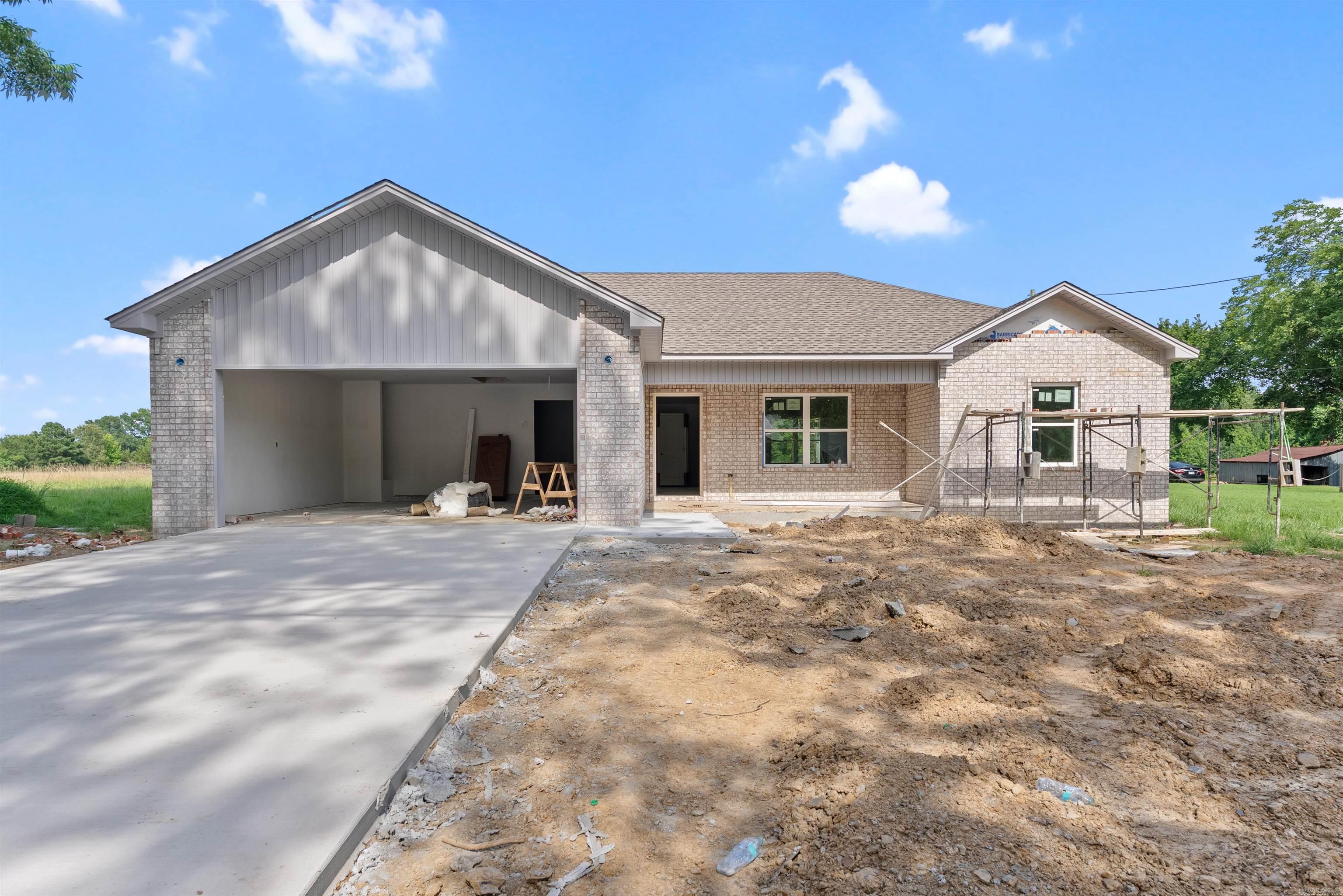 Welcome to this quality, new construction home built by Thomas Long Homes. This home features our Arkansas Plan - a fan favorite - with 3 bedrooms, 2 bathrooms, vaulted, open concept kitchen/dining/living, a great covered back porch, and a separate laundry room! Estimated completion is around the middle of August. The interior will feature luxury vinyl plank floors throughout, tile shower in primary bath, granite countertops, and more! Minutes from I-57 and close to Highway 319, these homes are great for anyone working in Cabot, Beebe, Little Rock, Conway, or Searcy. We can't wait for you to make this your new home! Agents, please see remarks.