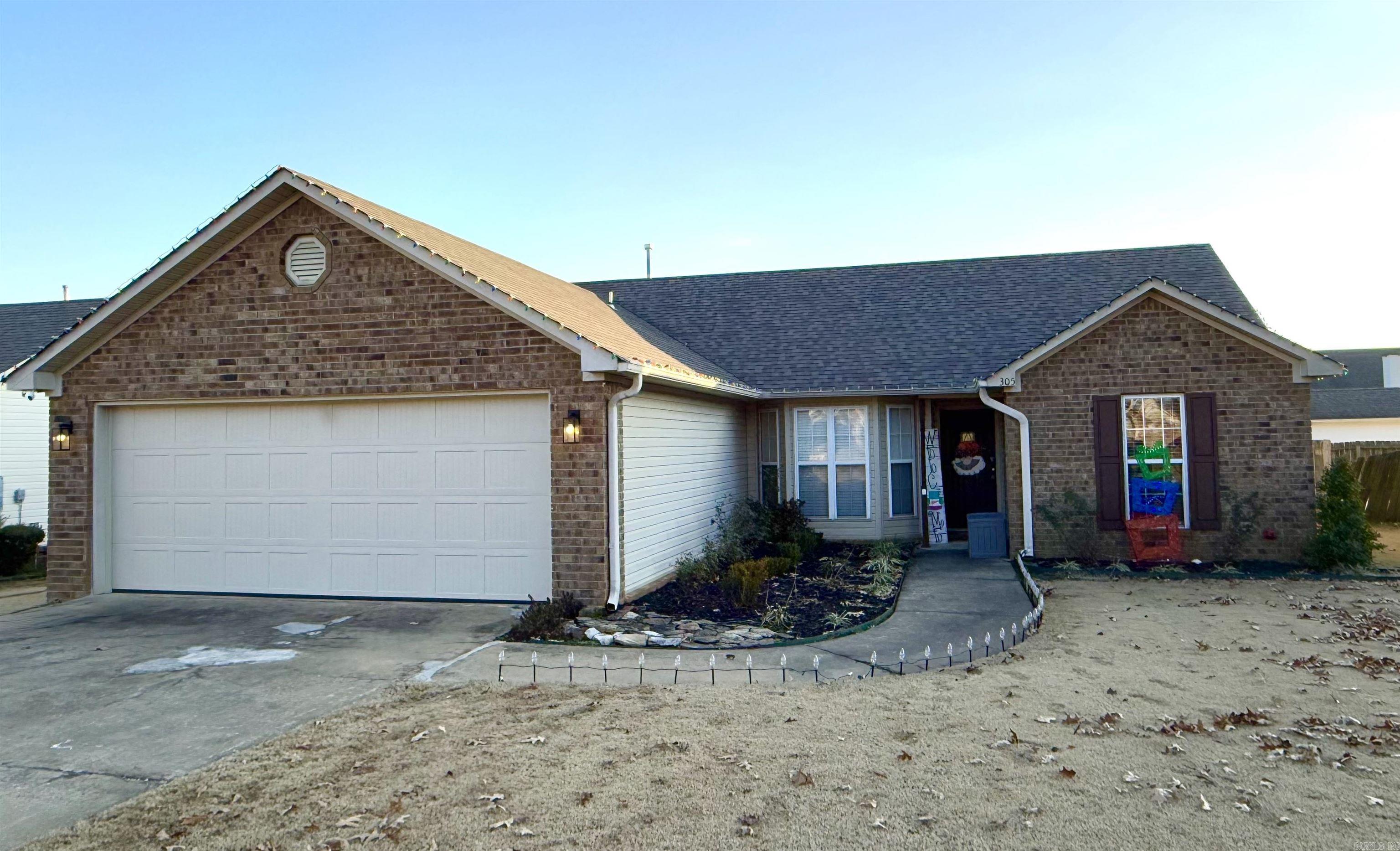 This 3 bedroom, 2 bathroom home is conveniently located just off Culberhouse Road in the Woodland Heights Subdivision. Upon entry, you are greeted by a spacious living room featuring vaulted ceilings, a gas fireplace, and plenty of windows giving in natural light. The perfect space to host friends/family or to cozy up after a long day. The beautiful kitchen features newly painted cabinets and tons of storage for any kitchen necessities. All interior walls in the house were freshly painted in the last two years, updating this home and giving it a fresh, clean look. The master suite is stunning, featuring an oversized walk-in closet, a shower/tub combo, and a large double vanity. Located just off of the living room, the secondary bedrooms both are a great size and feature amazing closet/storage space. They share a hallway bathroom. Head on out to the large backyard, and you will find a wood privacy fence, a concrete patio, and a custom block fire pit that will make the perfect entertainment area for family and guests. This home had all new landscaping completed over the summer, giving it a beautiful street view. The home has a new security system equipped with sensors and alarms.