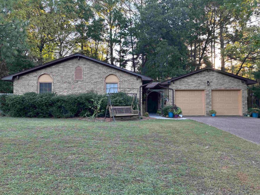 Nestled in the heart of Jonesboro, this 3 bedroom 2 bath home is close to shopping, groceries, and schools!  The kitchen area features granite countertops and stainless appliances, along with a breakfast area and formal dining area.  The living room has a gas log fireplace and hardwood floors.  The home also has a sunroom and a screened in porch.  The master suite has a walk-in closet, and private bathroom.  The large back yard has a couple of storage buildings.  The garage is also very spacious with lots of storage.  This house is move-in ready and won't last long, so call today to schedule your private tour.