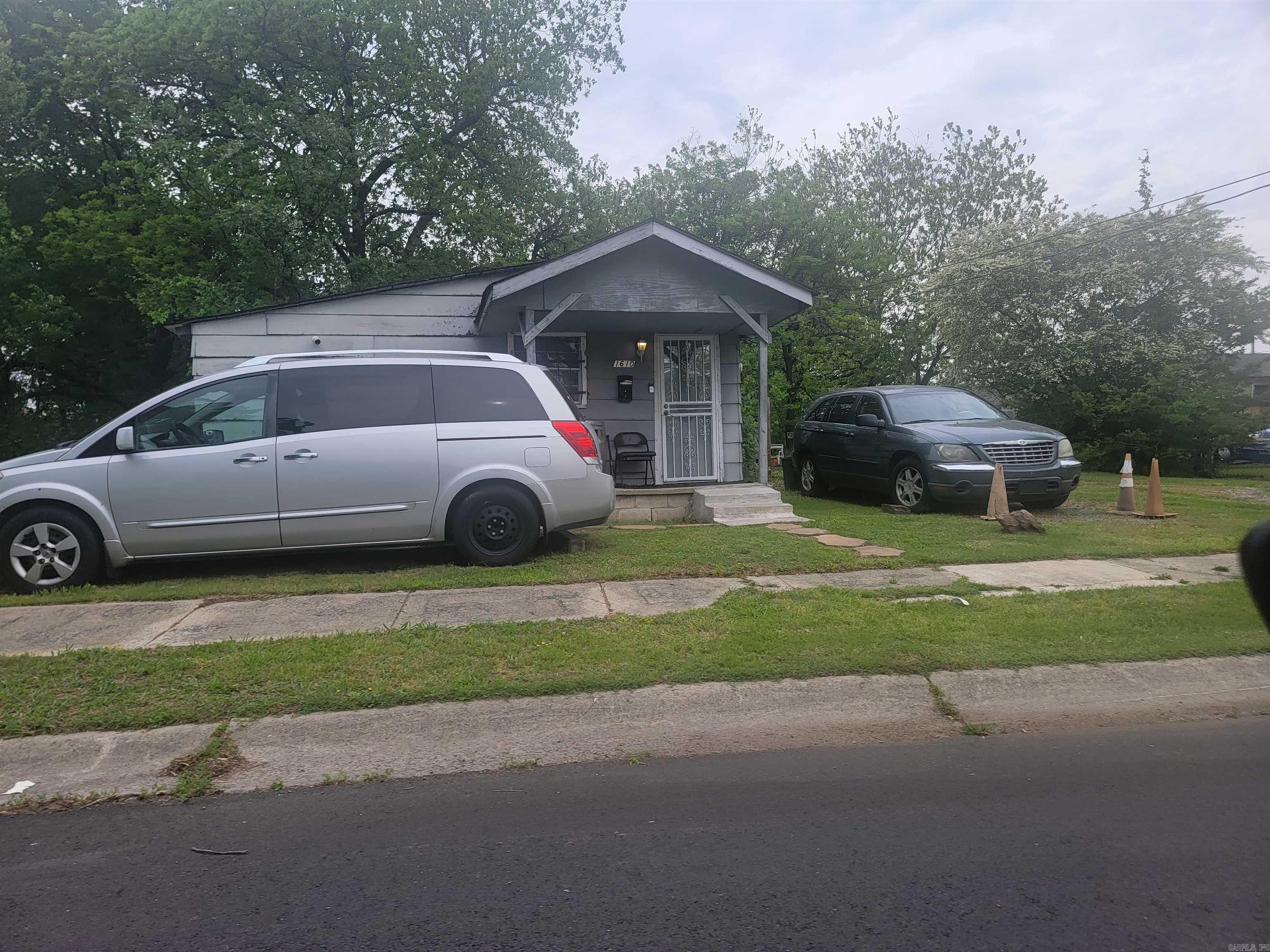 Nestled between Shorter College and East Gate Apartments is a wonderful opportunity to own this Brick home. This Brick home also comes with a Garage apartment, 2 small houses and a duplex. 5 dwellings and 6 doors. DO NOT DISTURB TENANTS!!! This wonderful opportunity has every unit occupied. Measuring encouraged. THERE WILL BE NO SHOWINGS UNTIL THERE IS AN ACCEPTED OFFER. SELLER WILL NOT SELL SEPARATE. Addresses include: 805, 807, 809, 810 E 16th Street and 1610 N. Vine