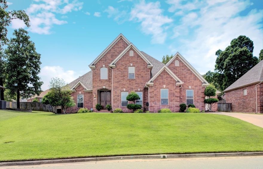 Beautiful custom-built home in Maumelle Valley Estates, originally built by the builder for his personal residence and purchased prior to occupancy—reflecting quality craftsmanship and thoughtful design. This well-maintained home offers 4 bedrooms and 3.5 baths, including two primary suites—one on the main level and a second upstairs with its own dedicated private bath. The spacious living area features custom built-ins surrounding a gas-log fireplace. Hardwood flooring enhances the grand foyer with custom chandelier and staircase, flowing into the formal dining area. The kitchen offers an island, maple cabinetry with glass accents, granite countertops, and stainless steel appliances. A private office with glass French doors is located just off the breakfast area. Upstairs includes the second primary suite with dedicated bath, two generously sized guest bedrooms, and a separate guest bath with dual vanities. A 3-car garage, front and back sprinkler system, French drains, and a 6-year-old roof complete the home. Enjoy outdoor living with a covered patio, extended flagstone patio, and additional seating area perfect for relaxing or a fire pit area.  Immaculate Condition!
